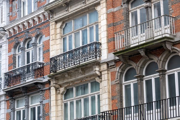 Historic building with elaborate brick facade and wrought-iron balcony, Blankenberge, Flanders, Belgium, Europe