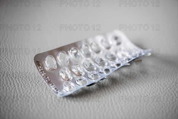 Symbolic image of medication misuse, empty blister pack
