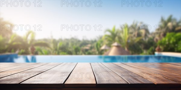Wooden empty table with tropical resort swimming pool and trees in blurry background. KI generiert, generiert AI generated