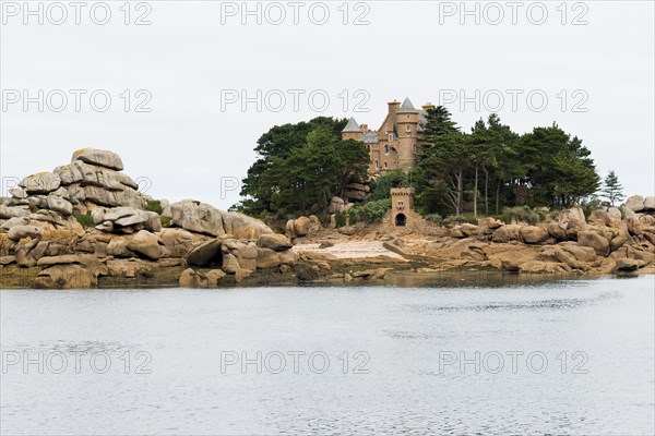 Castle and granite rocks, Tregastel, Cote de Granit Rose, Cotes d'Armor, Brittany, France, Europe