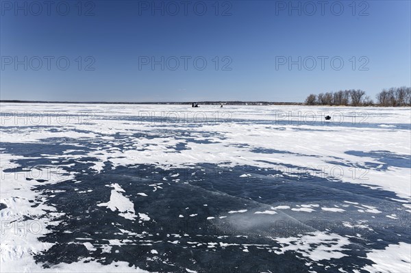 Winter, snow drifts on frozen riverscape, Saint Lawrence River, Province of Quebec, Canada, North America