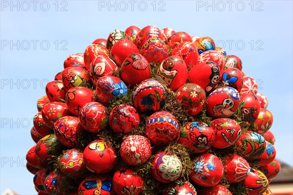 Detail of an Easter fountain in Franconian Switzerland, Bamberg district, Upper Franconia, Germany, many colourful blown-out and dyed eggs as decoration, Easter custom, Europe