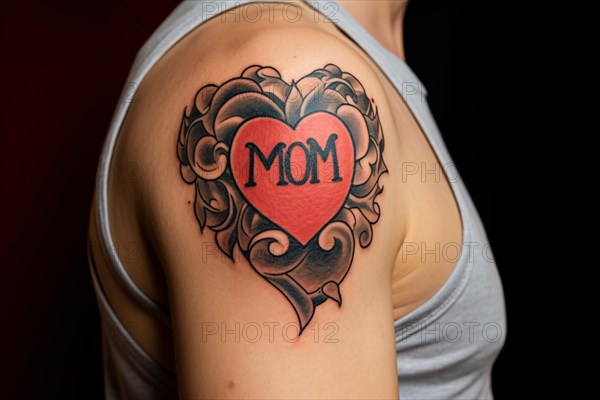 Man's upper arm with tattoo with red heart with text 'MOM'. KI generiert, generiert AI generated