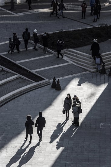 Sunlight floods the inner courtyard of the Fisherman's Bastion, travel, city trip, tourism, light, shadow, silhouettes, Eastern Europe, capital, Budapest, Hungary, Europe