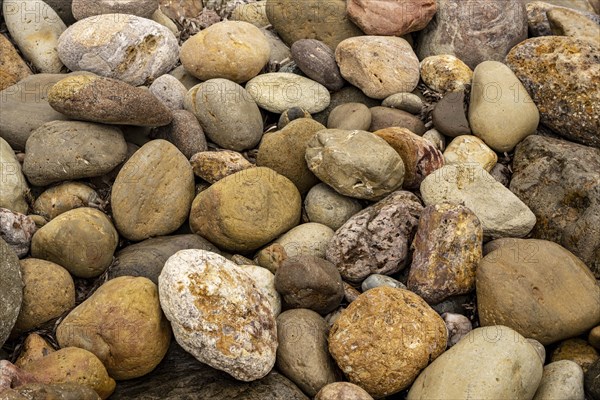 Colourful stones on the beach of Malolo, Milos, Cyclades, Greece, Europe