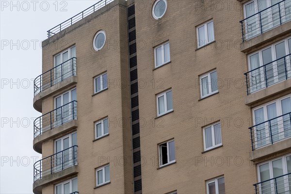 A section of a cream-coloured residential building with balconies, Blankenberge, Flanders, Belgium, Europe