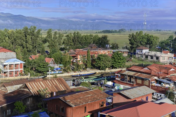 Aerial view of a town with traditional houses surrounded by nature, Pindaya, Inle Lake, Myanmar, Asia
