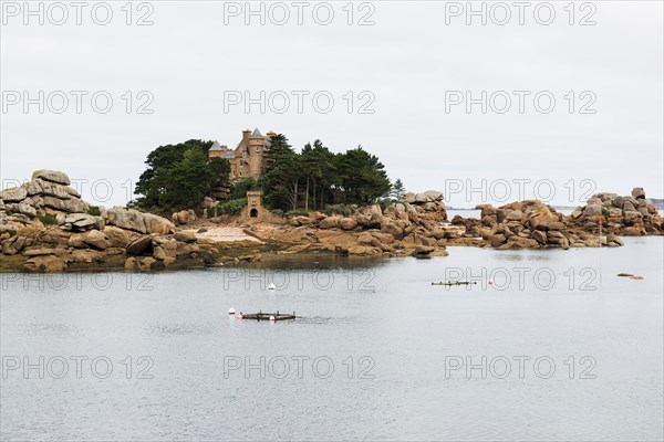 Castle and granite rocks, Tregastel, Cote de Granit Rose, Cotes d'Armor, Brittany, France, Europe