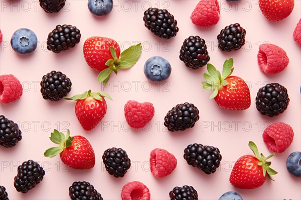 Top view of mix of strawberry, blackberry, blueberry and raspberry fruits on pink background. KI generiert, generiert AI generated