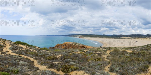 Coastal section at the southern Algarve, panorama, nature, rocky coast, beach, beach section, bay, sea bay, overview, tourism, journey, holiday, beach walk, landscape, beach landscape, natural landscape, nobody, empty, summer, cloudy, Atlantic, Atlantic Ocean, Carrapateiera, Portugal, Europe