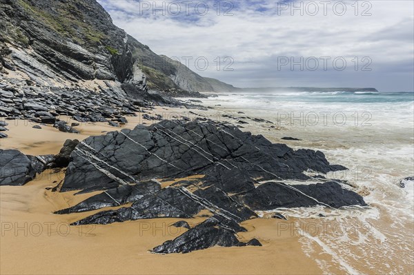 Algarve beach, wide, black rock, rocky coast, nobody, spray, cloud, summer holiday, beach holiday, sea, ocean, Atlantic, Atlantic Ocean, sandy beach, coast, Atlantic coast, national park, geography, climate, travel, empty, sun, nature, natural landscape, beach landscape, beach walk Aljezur, Carrapateira, Sagres, Portugal, Europe