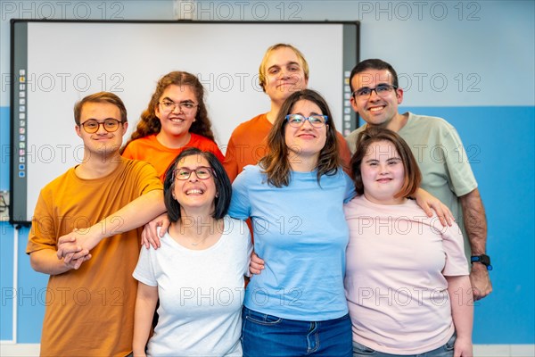 Frontal formal portrait of a disabled yoga class members standing smiling at camera