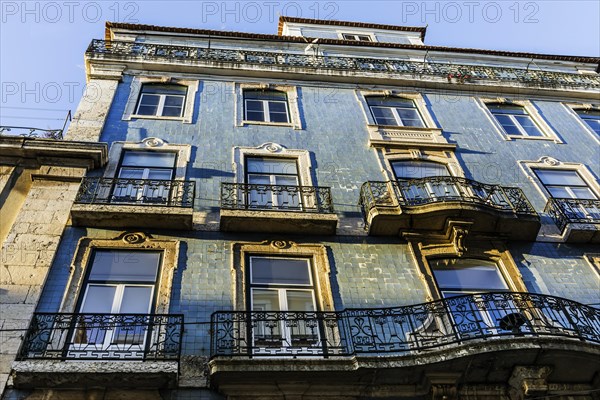 Old building, facade with typical azulejos, tiles in the old town, city, architecture, blue, architecture, window, facade, house facade, old, dilapidated, balcony, urban, house, house wall, property, building, antique, history, architectural history, tradition, pattern, Portuguese, Lisbon, Portugal, Europe
