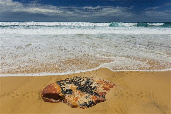 Textured stone on the beach, sea, Atlantic coast, coast, surf, surf, emotion, calmness, nobody, empty, travel, tourism, holiday, beach holiday, water, seawater, salt water, Atlantic, ocean, force of nature, puristic, symbol, wanderlust, waves, holiday feeling, relaxation, calmness, recreation, quiet, weather, climate, esoteric, esoteric, bathing, bathing holiday, coastal landscape, Algarve, Portugal, Europe