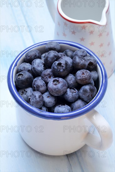 Blueberries in cup, cultivated blueberry