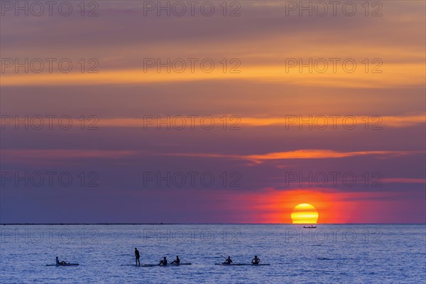 Sunset with course for stand-up-paddeleng, water sports, evening mood, sun, travel, holiday, tourism, paradise, holiday paradise, sky, evening sky, sea, ocean, travel photo, beach, people, silhouette, romantic, romance, beach holiday, nature, outdoor, active holiday, coast, peace, serenity, holiday feeling, sports holiday, Khao Lak, Thailand, Asia