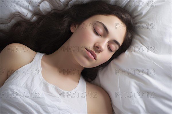 Young woman with dark hair sleeping on white large pillow. KI generiert, generiert AI generated