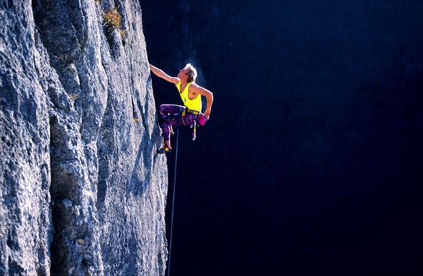 Climber on a route in the 7th degree of difficulty of the German scale, Wittlinger Felsen, Urach Valley, Baden-Wuerttemberg, Germany, retro, vintage, old, retro, vintage, old, Europe