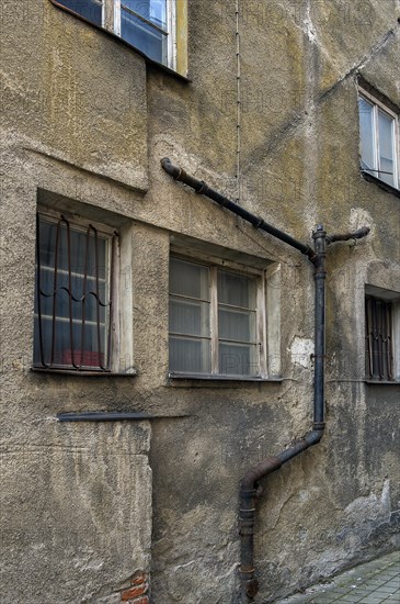 Rotten facade with external sewage pipe, Kempten, Allgaeu, Bavaria, Germany, Europe