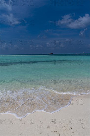 Turquoise waters on a white sand beach, Bangaram island, Lakshadweep archipelago, Union territory of India