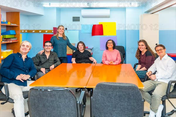 Group class photo portrait in a center for people with special needs