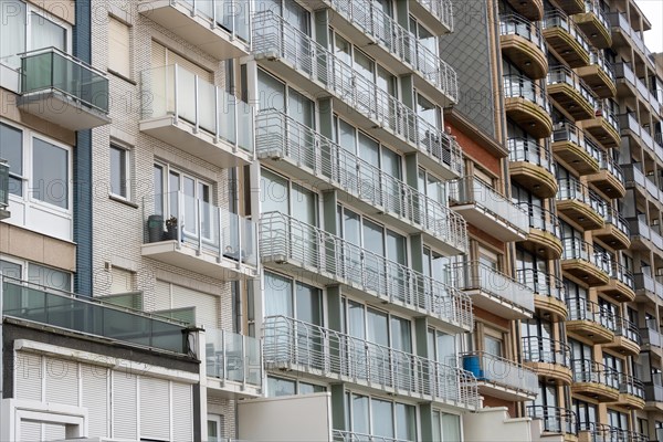 Stack of flat balconies with glass railings on a multi-storey building, Blankenberge, Flanders, Belgium, Europe