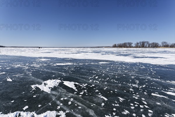 Winter, snow drifts on frozen riverscape, Saint Lawrence River, Province of Quebec, Canada, North America