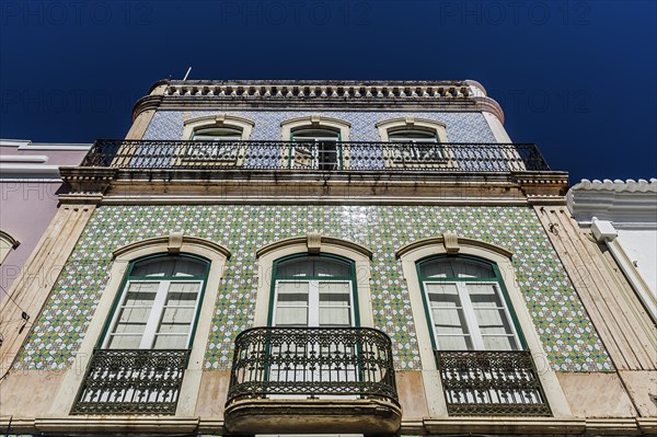 House with azulejo facade, old building, architecture, tiles, craftsmanship, traditional, tradition, building, property, tile, architecture, green, facade, Mediterranean, colour scheme, decoration, living, old town, old building, city trip, Silves, Algarve, Southern Europe, Portugal, Europe