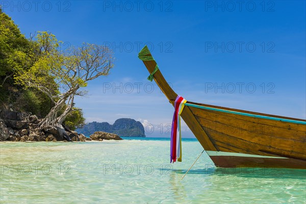 Bamboo Island, boat, wooden boat, longtail boat, bay, sea bay, sea, ocean, Andaman Sea, tropics, tropical, island, rock, rock, water, tradition, faith, decorated, beach, beach holiday, environment, clear, clean, peaceful, picturesque, sea level, climate, fishing boat, travel, tourism, natural landscape, paradisiacal, beach holiday, sun, sunny, holiday, dream trip, holiday paradise, paradise, coastal landscape, nature, idyllic, turquoise, Siam, exotic, travel photo, cloth, colourful, tree, sandy beach, Thailand, Asia