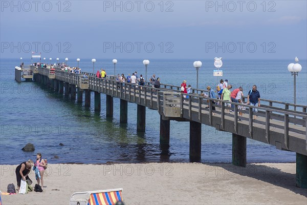 Tourists on the pier in Kuehlungsborn, Mecklenburg-Western Pomerania, Germany, Europe