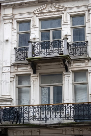 An old white building with decorative balcony and windows, Blankenberge, Flanders, Belgium, Europe