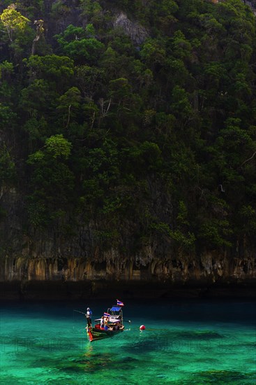 Lo Sama bay on Ko Phi Phi Don, sea, ocean, Andaman Sea, tropics, tropical, island, rock, rock, water, fisherman, fishing boat, fishing, travel, tourism, holiday, dream trip, holiday paradise, flora, forest, tree, rainforest, jungle, paradise, landscape, coastal landscape, nature, idyllic, boat, turquoise, climate, Siam, seascape, exotic, Maya bay, Thailand, Asia