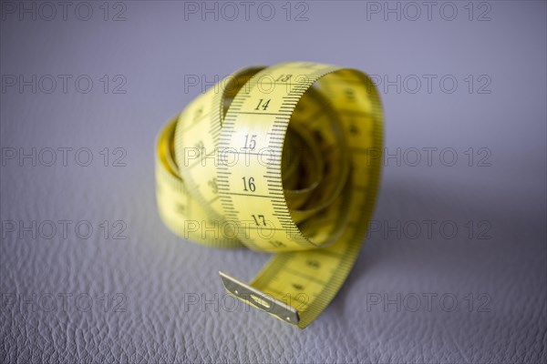 Yellow tape measure, roll