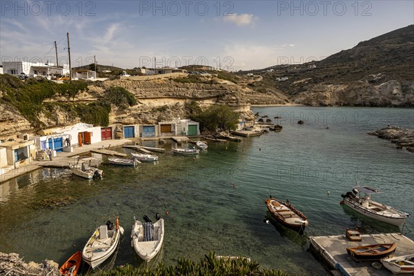 View of the small fishing harbour of Mantrakia, Milos, Cyclades, Greece, Europe