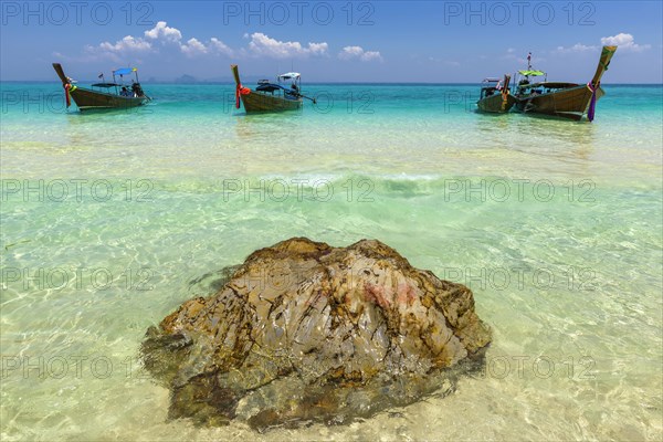 Fishing boat, wooden boat, bathing beach, swimming, bathing, bay, bay, sea, ocean, Andaman Sea, tropical, island, rock, rock, water, beach, beach holiday, Caribbean, environment, clear, clean, peaceful, picturesque, stone, sea level, climate, travel, tourism, natural landscape, paradisiacal, beach holiday, sun, sunny, holiday, dream trip, holiday paradise, paradise, coastal landscape, nature, idyllic, turquoise, Siam, exotic, travel photo, beach landscape, sandy beach, Phi Phi Island, Thailand, Asia