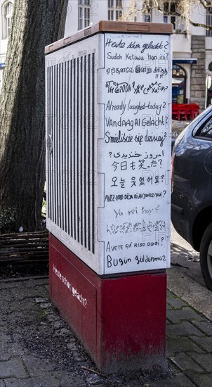 Foreign languages, distribution box on public street, Berlin, Germany, Europe