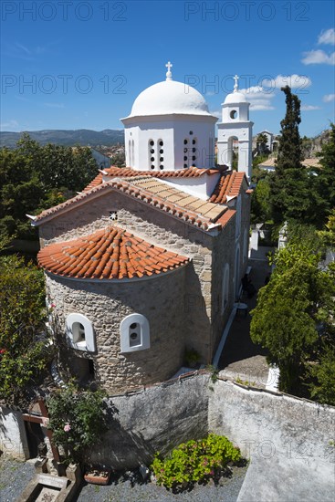 View of a church with a white dome and terracotta roofs against a clear blue sky, Holy Monastery of Timi Prodromos, Byzantine fortress, nunnery, Koroni, Pylos-Nestor, Messinia, Peloponnese, Greece, Europe