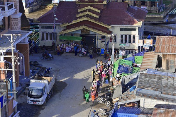 View of a busy street with market activities and colourful details, Pindaya, Inle Lake, Myanmar, Asia