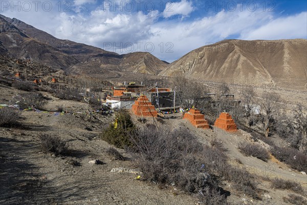 Colourfully painted Buddhist stupa, Ghar Gumba monastery, Kingdom of Mustang, Nepal, Asia