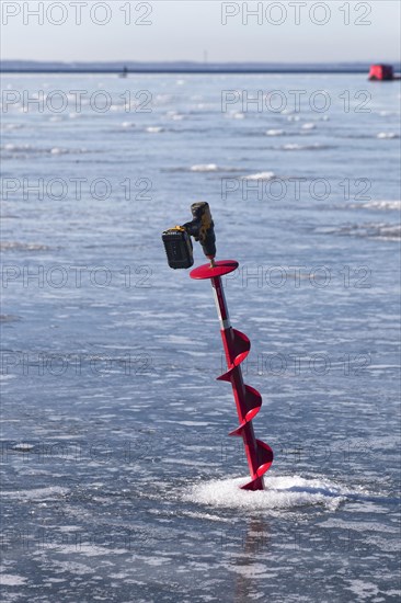 Winter riverscape, ice drill, detail, Saint Lawrence River, Province of Quebec, Canada, North America