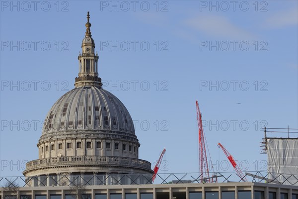 St Paul's Cathedral with industrial cranes in the background, City of London, England, United Kingdom, Europe
