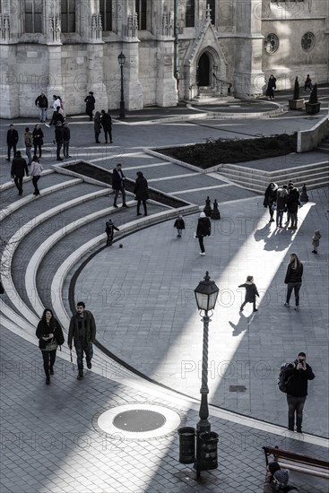 Sunlight floods the inner courtyard of the Fisherman's Bastion, travel, city trip, tourism, light, shadow, silhouettes, Eastern Europe, capital, Budapest, Hungary, Europe