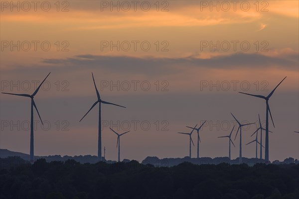 Wind turbines in the sunset, Schoenberg, Mecklenburg-Vorpommern, Germany, Europe