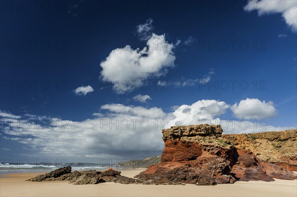 Algarve beach, wide, red rock, rocky coast, nobody, clear, blue sky, cloud, summer holiday, beach holiday, sea, ocean, Atlantic, Atlantic Ocean, sandy beach, coast, Atlantic coast, national park, geography, climate, travel, neutral, empty, sun, nature, natural landscape, beach landscape, surfer beach, Aljezur, Carrapateira, Sagres, Portugal, Europe