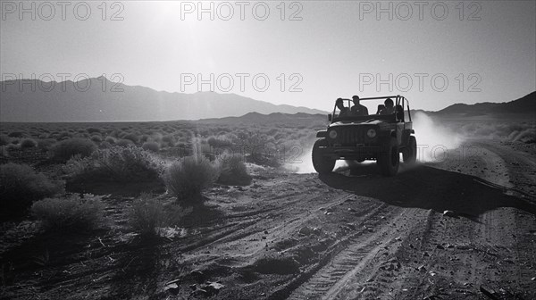 A jeep kicks up dust while driving on a desert trail in an arid landscape, AI generated