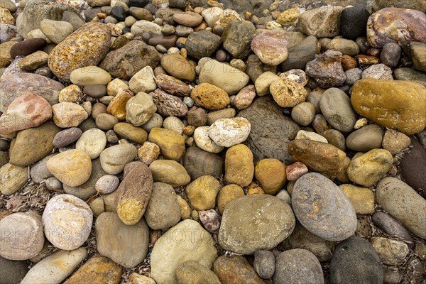 Colourful stones on the beach of Malolo, Milos, Cyclades, Greece, Europe