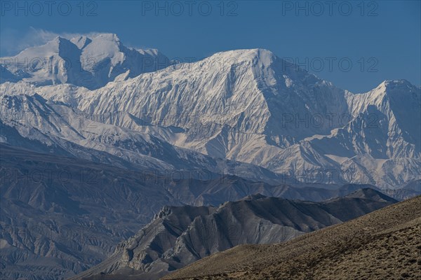 Desert landscape before the Annapurna mountain range, Kingdom of Mustang, Nepal, Asia