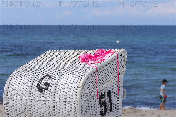 Bikini on a white beach chair on the beach, Kuehlungsborn, Mecklenburg-Vorpommern, Germany, Europe