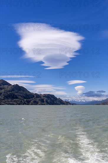 Boat trip, glacial lake, cloud, UFO, Lago Grey, Torres del Paine National Park, Parque Nacional Torres del Paine, Cordillera del Paine, Towers of the Blue Sky, Region de Magallanes y de la Antartica Chilena, Ultima Esperanza Province, UNESCO Biosphere Reserve, Patagonia, End of the World, Chile, South America