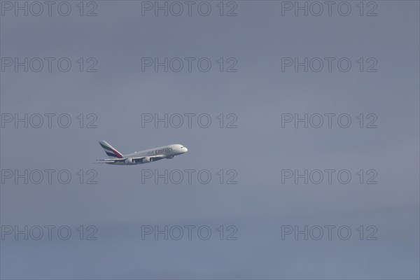 Airbus A380 aircraft of Emirates airlines in flight, England, United Kingdom, Europe
